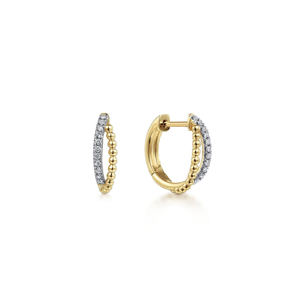 14K YELLOW GOLD TWISTED PAVE DIAMOND HUGGIE EARRINGS - John Thomas Jewelers.