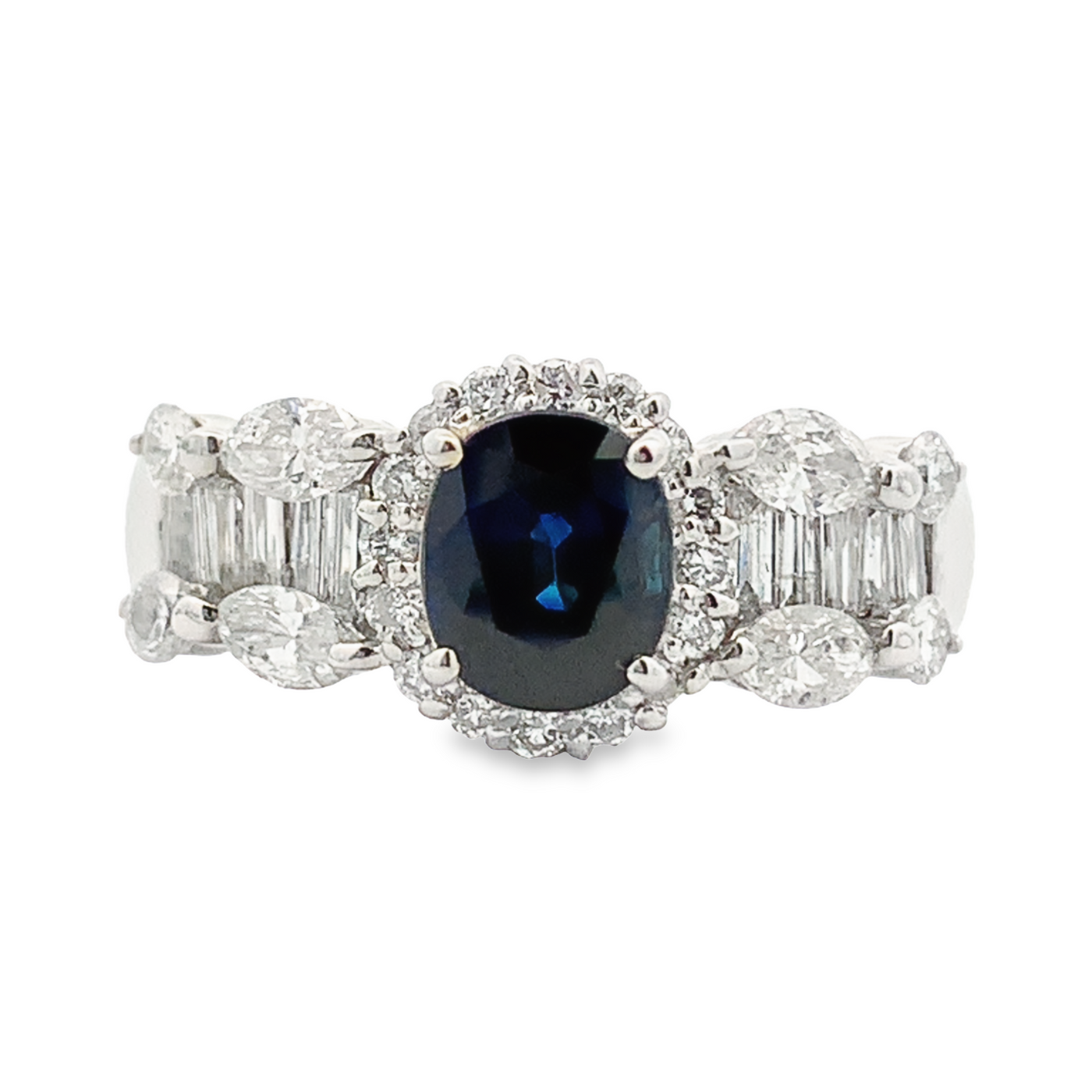PLATINUM WITH BLUE SAPPHIRE RING FEATURING MARQUISE DIAMONDS