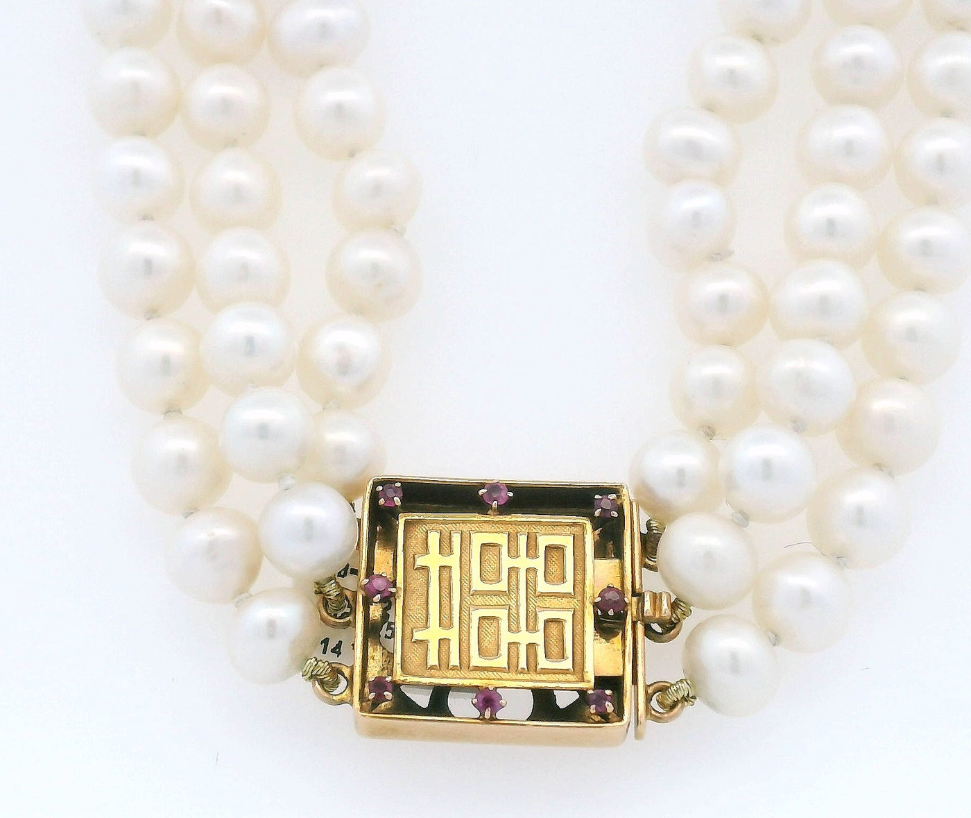 TRIPLE PEARL STRAND WITH RUBY CLASP
