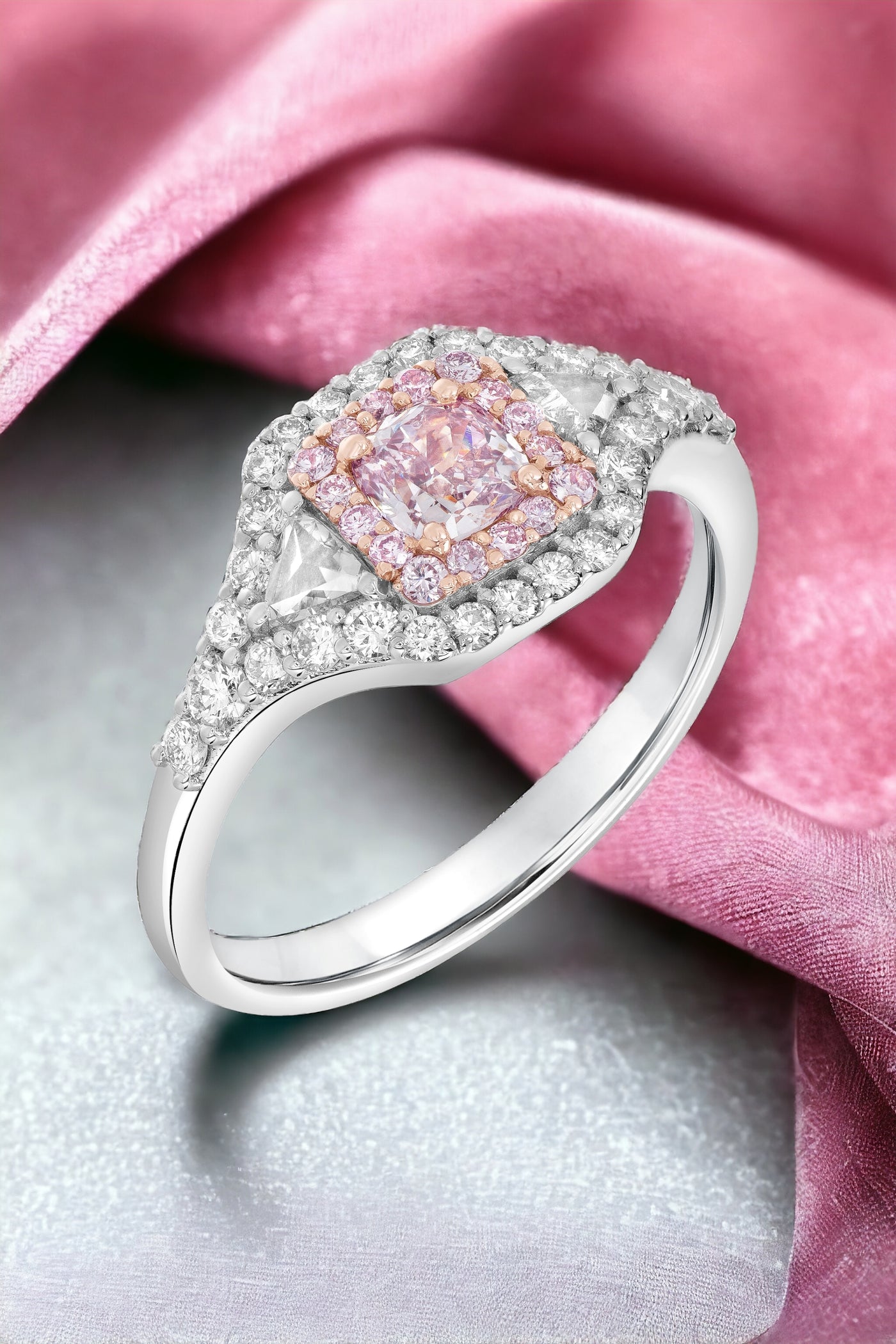 18KW .17 CTW CENTER PINK CUSHION, TRILLION, PINK MELEE, AND WHITE MELEE DIAMOND RING