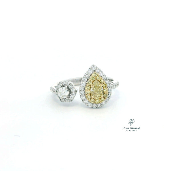 18K TWO TONE PEAR SHAPED FANCY YELLOW DIAMOND RING WITH HEXAGON DIAMOND AND WHITE DIAMPOD HALO
