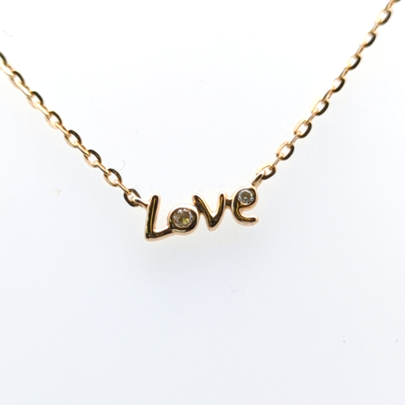 MINITURE LOVE NECKLACE IN 10K WHITE GOLD