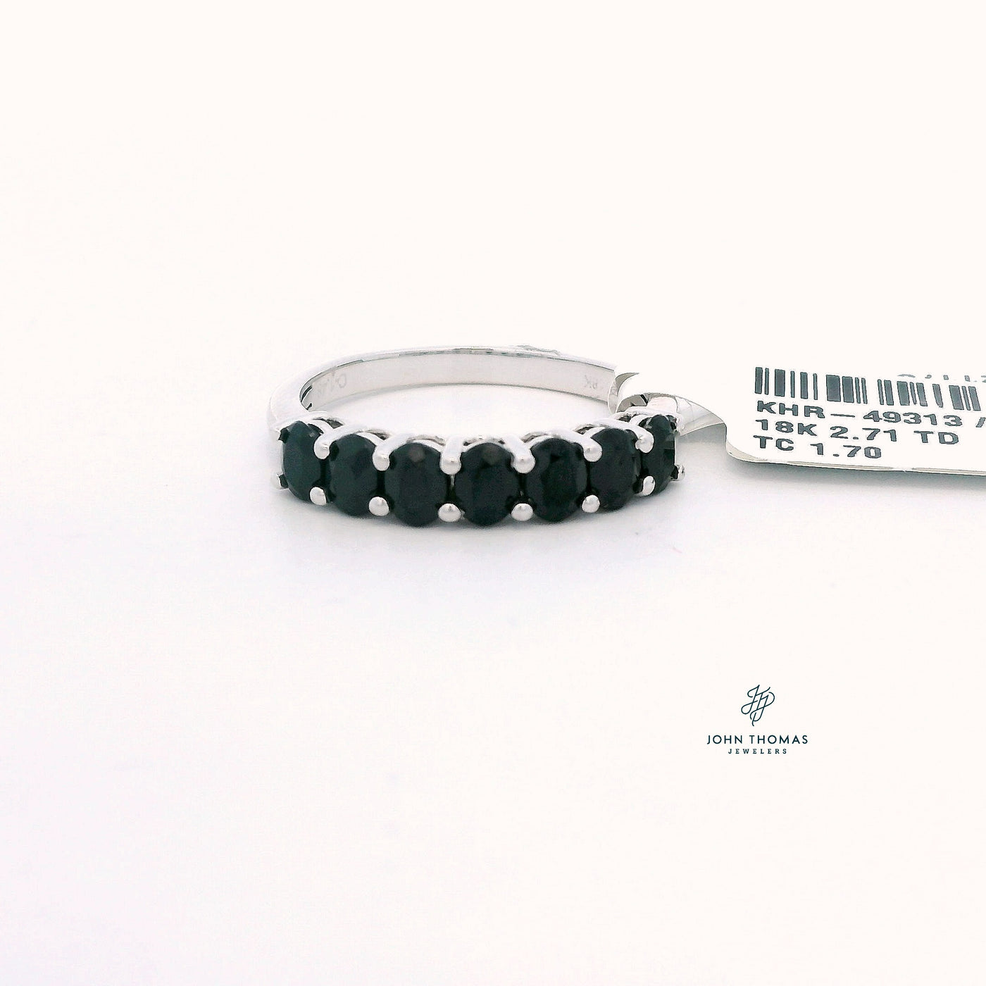 SEVEN STONE BLACK SPINEL RING IN 18K WHITE GOLD