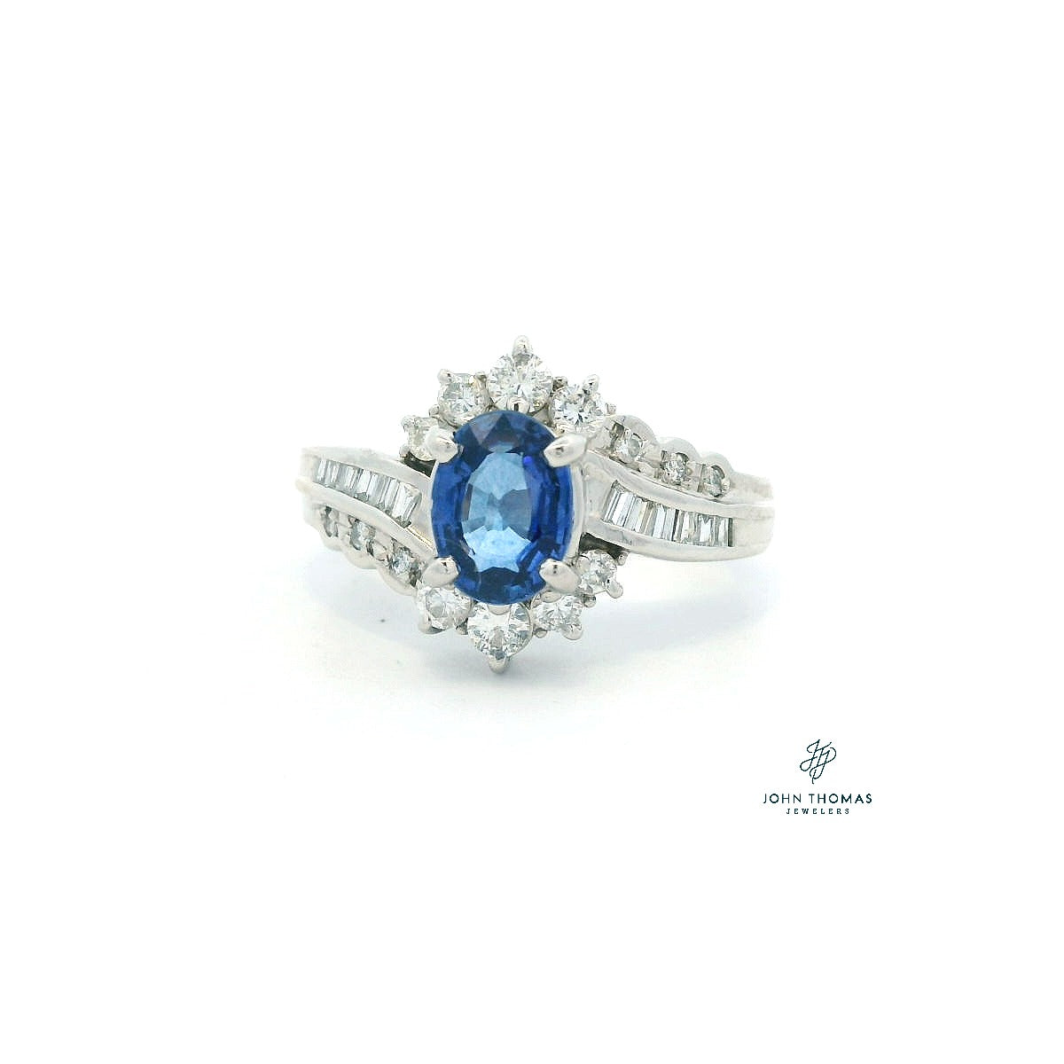 PLATINUM OVAL CEYLON SAPPHIRE WITH ROUND AND BAGUETTE DIAMOND RING
