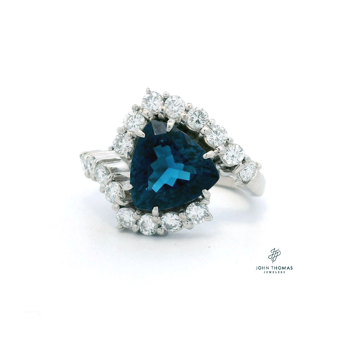 PLATINUM TOURMALINE "INDICOLITE" TRILLION CENTER WITH .85CTW SURROUNDING DIAMONDS