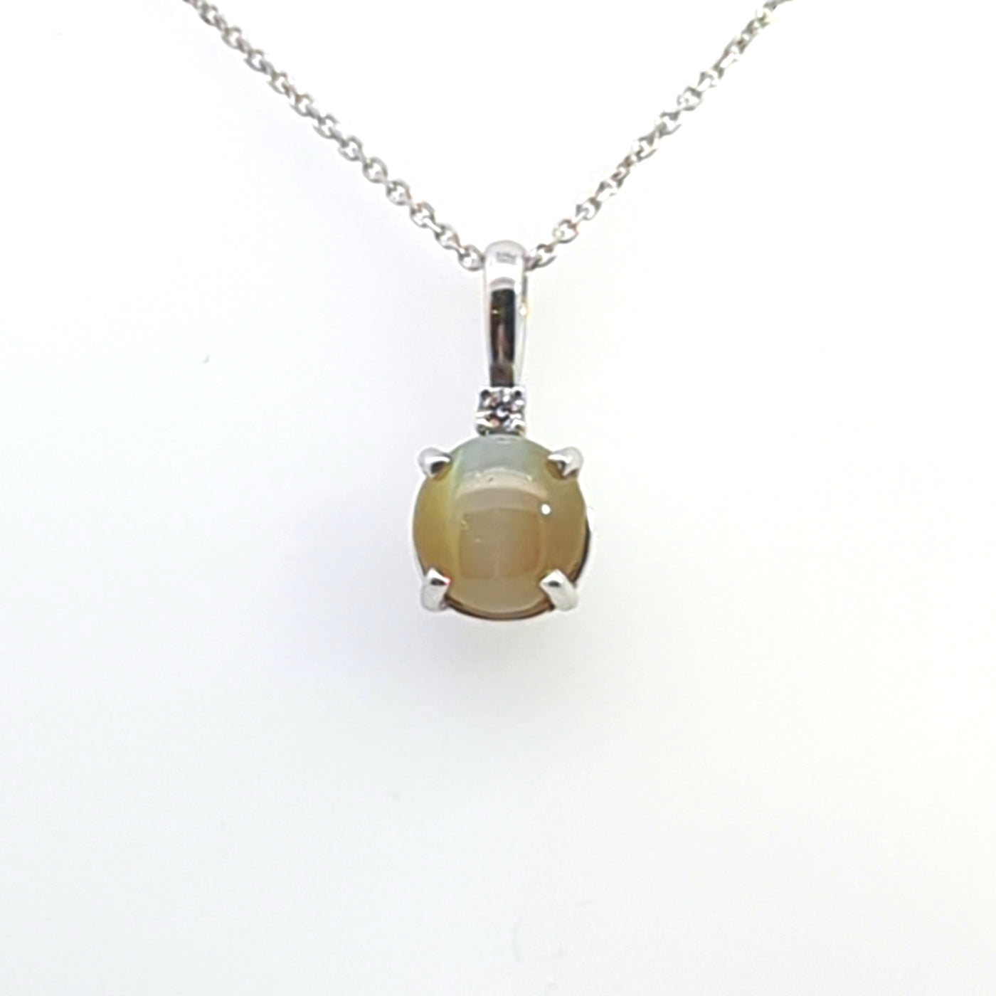 CATS EYE CHRYOBERYL AND DIAMOND PENDANT