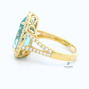 14KY AQUAMARINE AND DIAMOND RING
