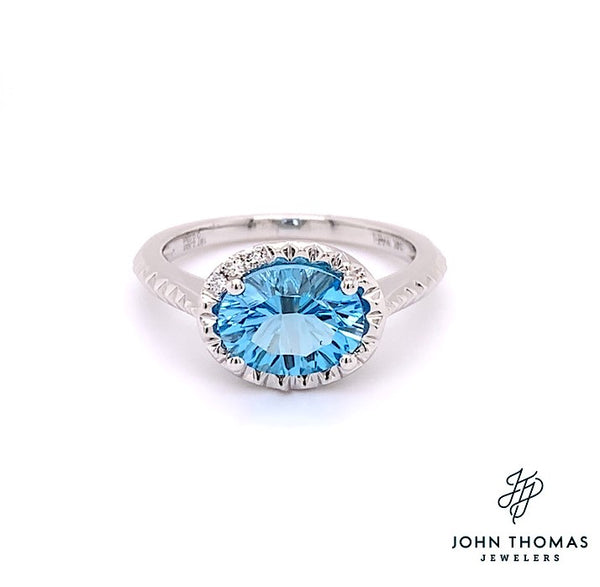 14K OVAL WHITE GOLD SWISS BLUE TOPAZ RING WITH DIAMOND ACCENTS